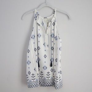 Classy White Sleeveless Blouse